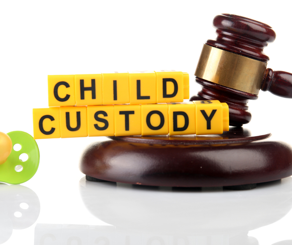 Child Custody concept with a judge’s gavel and letter blocks spelling 'Child Custody.'